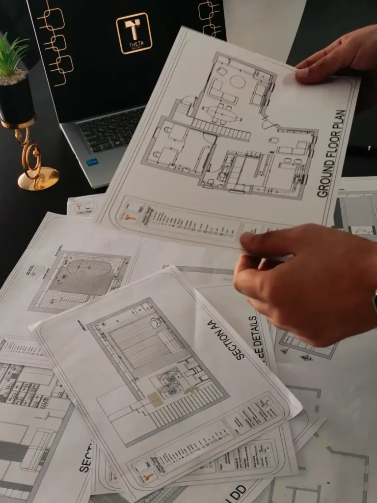 Architecture holding a house plan.webp