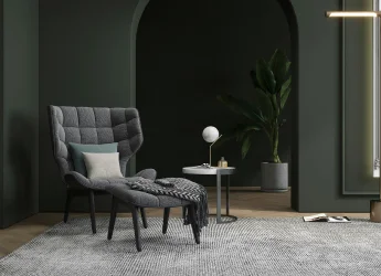 Interior design for a comfy chair and a small lamp